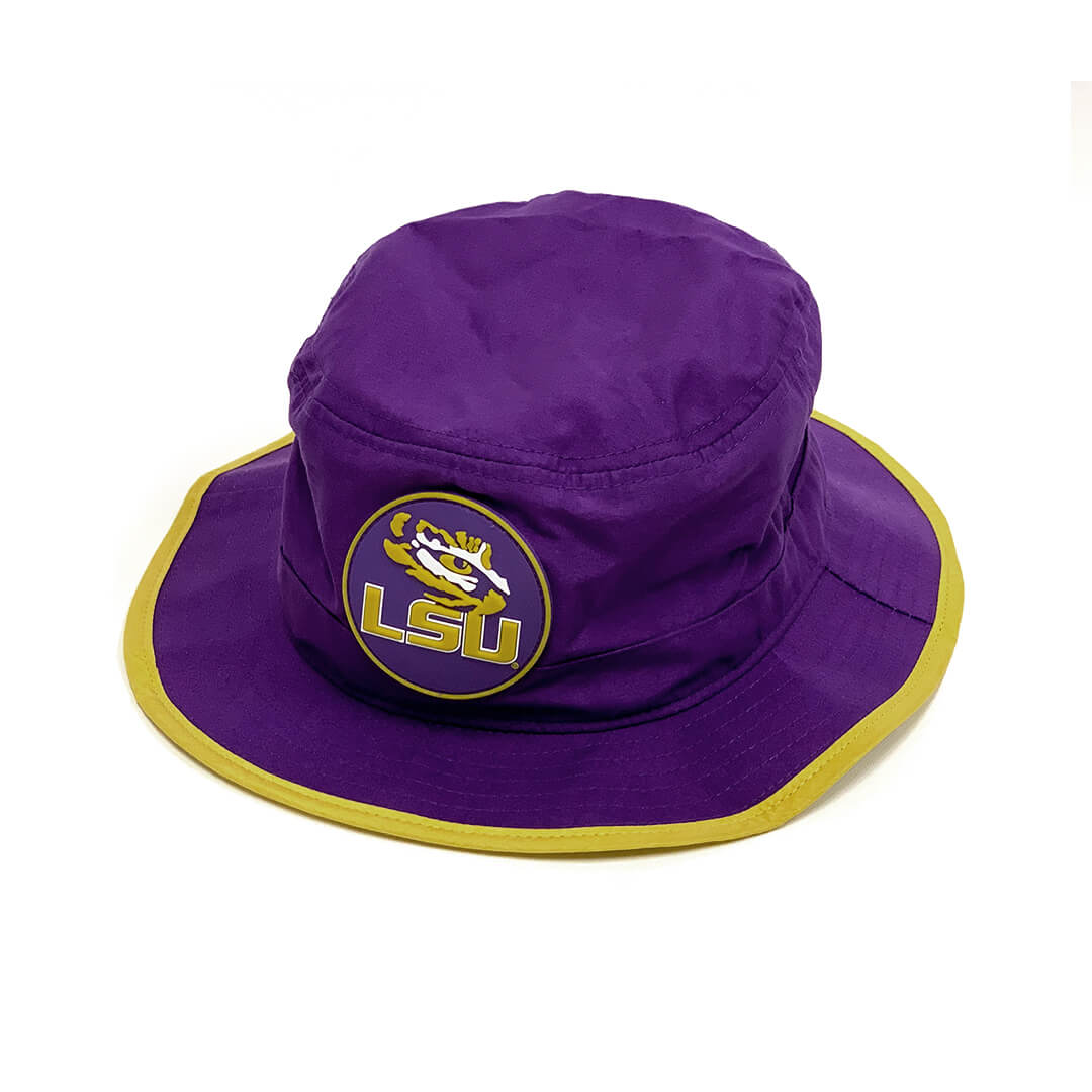 A purple bucket hat with a circular patch with the LSU logo.